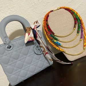 Grey quilted box style bag